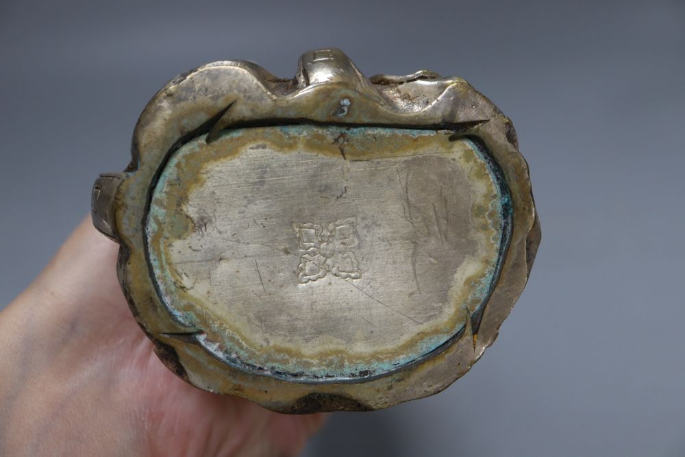 A Chinese silvered metal figure of an elder, height 24cm